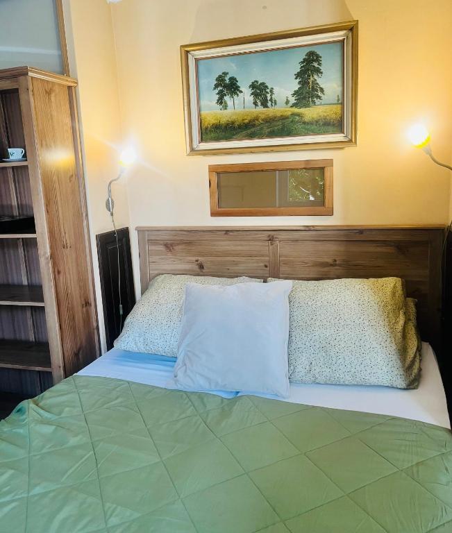 Postel nebo postele na pokoji v ubytování Art HOTEL