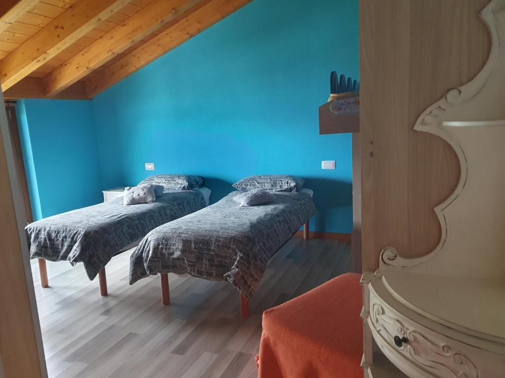 Posteľ alebo postele v izbe v ubytovaní Appartamenti Da Melissa