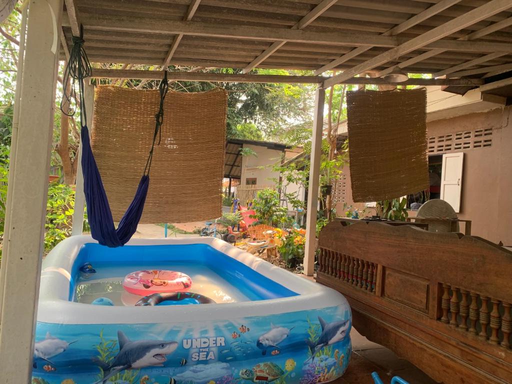 Bazén v ubytování บ้านใจแปงโฮมสเตย์ Ban Jaipang Homestay nebo v jeho okolí