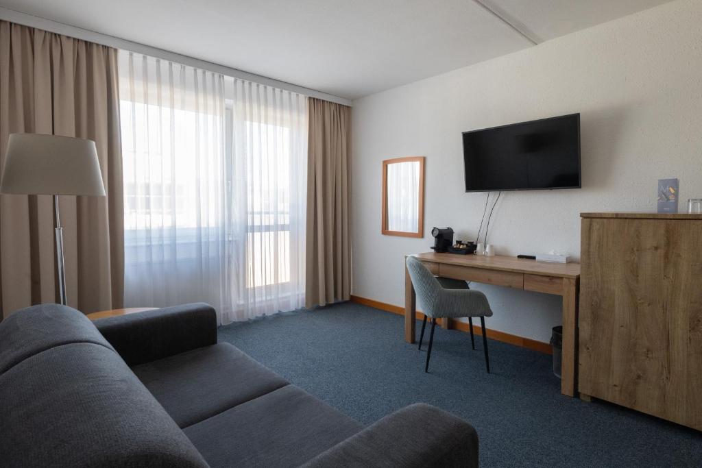 TV a/nebo společenská místnost v ubytování OREA Hotel Voro Brno