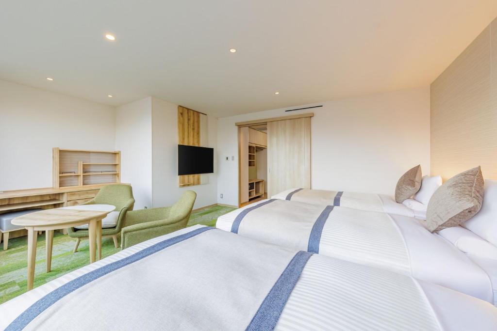 Postel nebo postele na pokoji v ubytování KAMENOI HOTEL Nagatoro Yorii