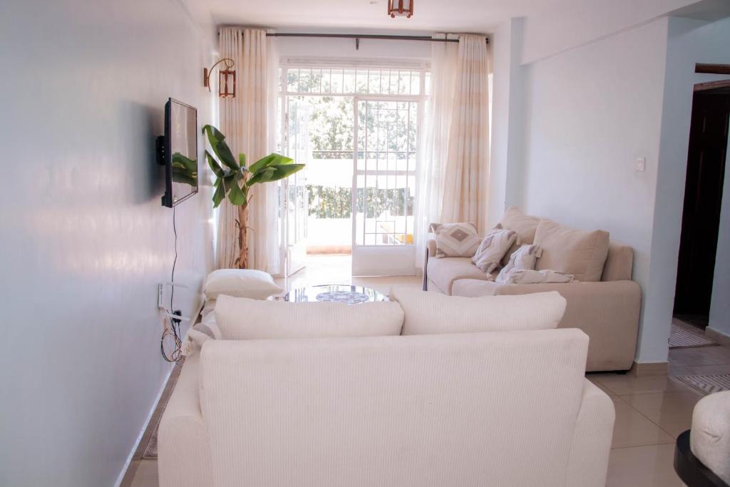 TV a/nebo společenská místnost v ubytování Bellissima Homes