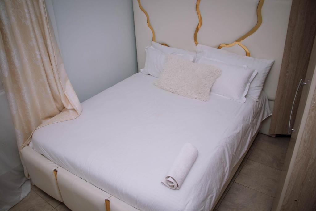 Postel nebo postele na pokoji v ubytování Bellissima Homes