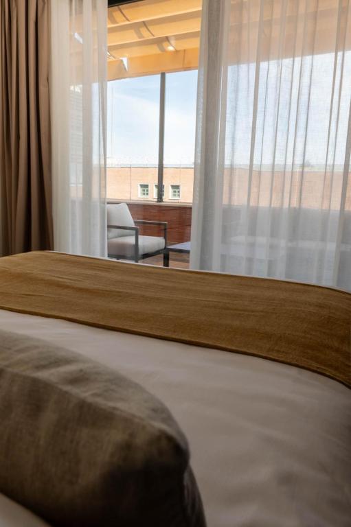 Postel nebo postele na pokoji v ubytování My Suite Madrid