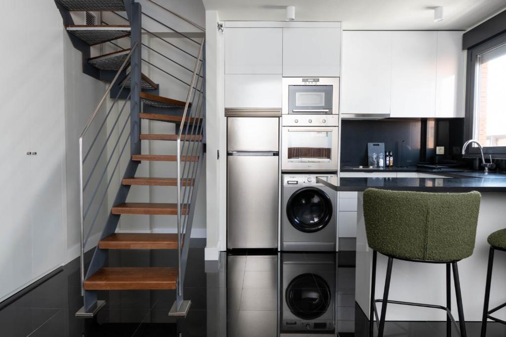 Kuchyň nebo kuchyňský kout v ubytování My Suite Madrid