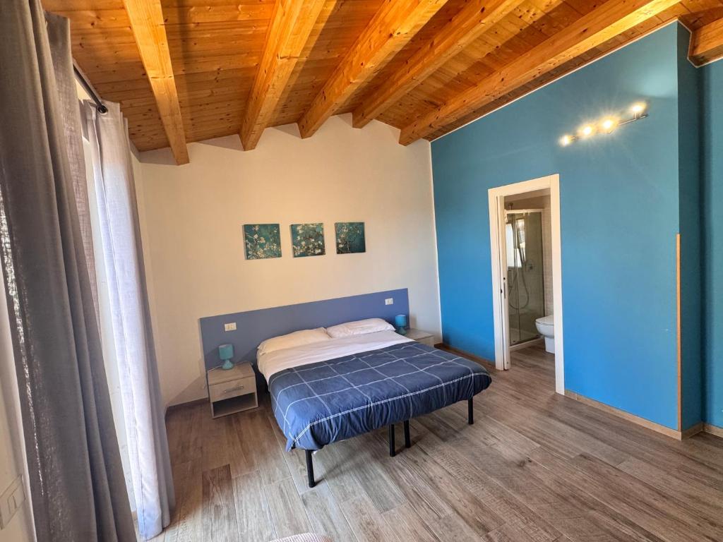 Postel nebo postele na pokoji v ubytování alex rooms