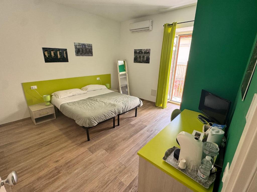 Postel nebo postele na pokoji v ubytování alex rooms
