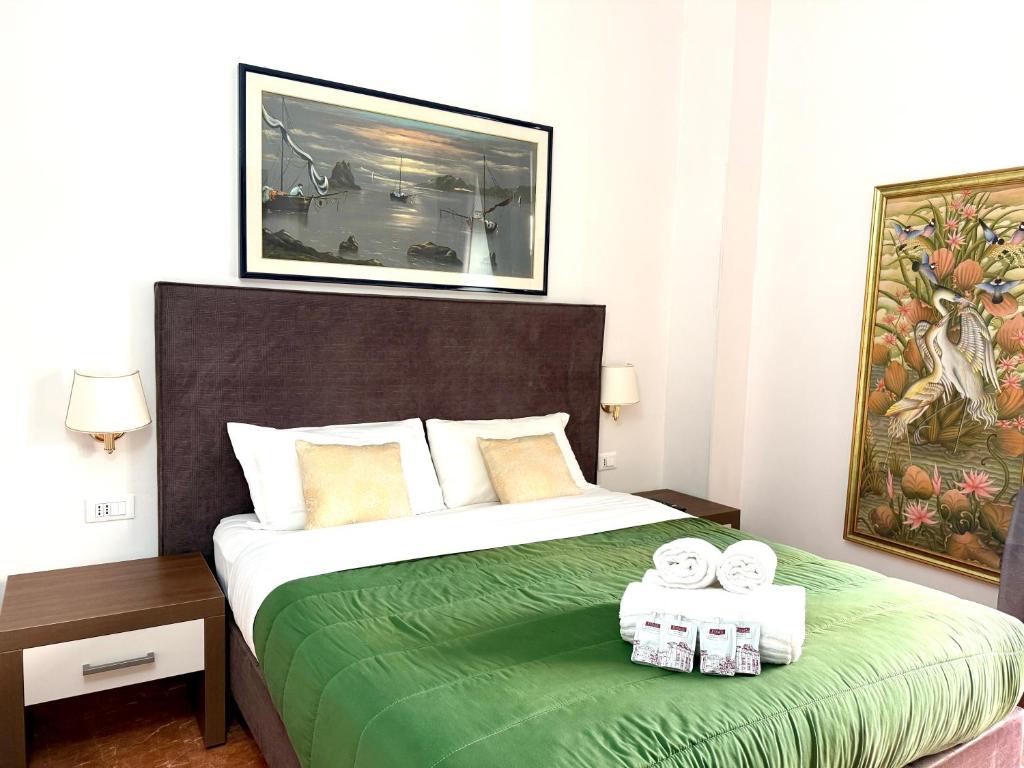 Ліжко або ліжка в номері Grand Gaeta