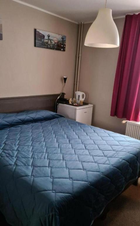 Postel nebo postele na pokoji v ubytování Center Elite