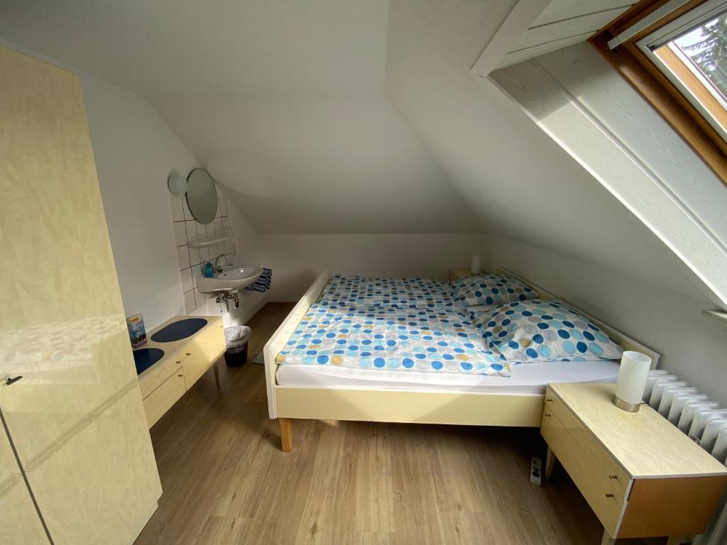 Postel nebo postele na pokoji v ubytování Schlumbohm