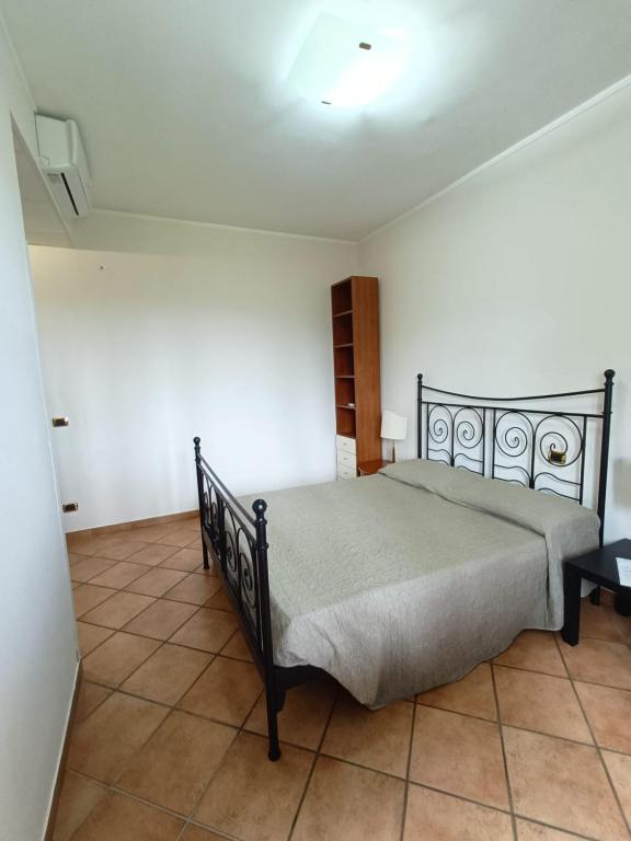 Postel nebo postele na pokoji v ubytování Relais Albalonga