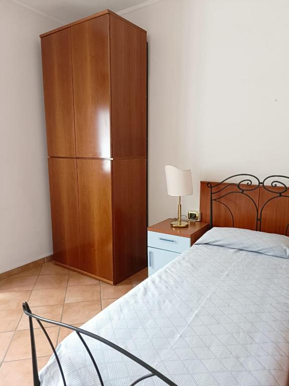 Postel nebo postele na pokoji v ubytování Relais Albalonga