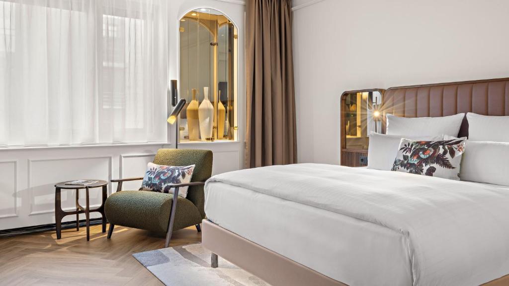 Postel nebo postele na pokoji v ubytování Hotel Bristol Berlin