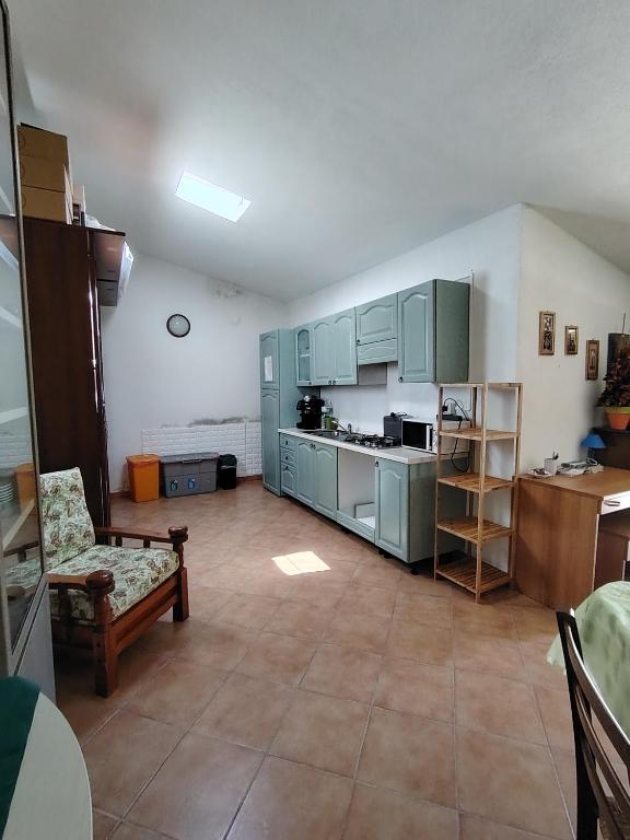 Kuchyň nebo kuchyňský kout v ubytování AGRITURISMO SA è PADEDDA