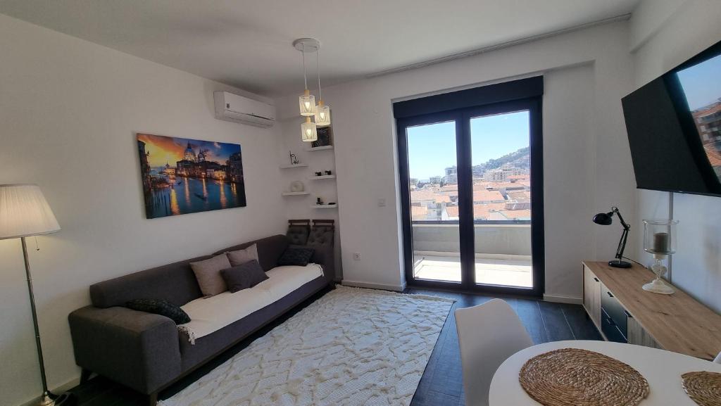 Ένα ή περισσότερα κρεβάτια σε δωμάτιο στο Tehnoplus apartment