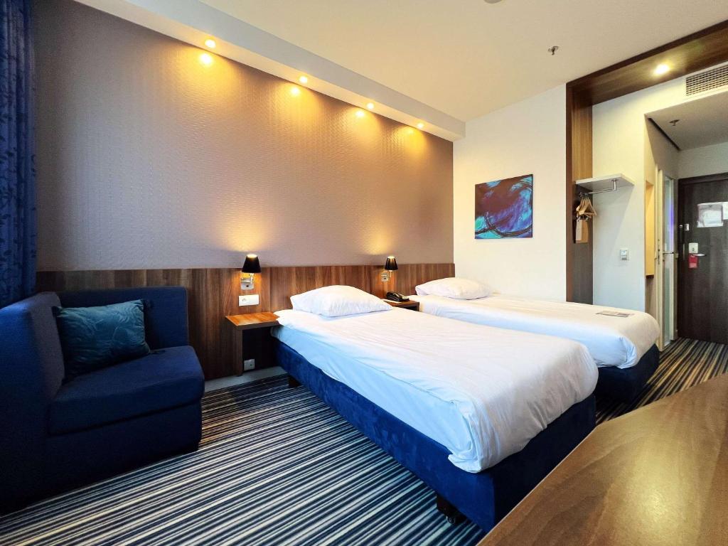 Postel nebo postele na pokoji v ubytování ibis Styles Wałbrzych