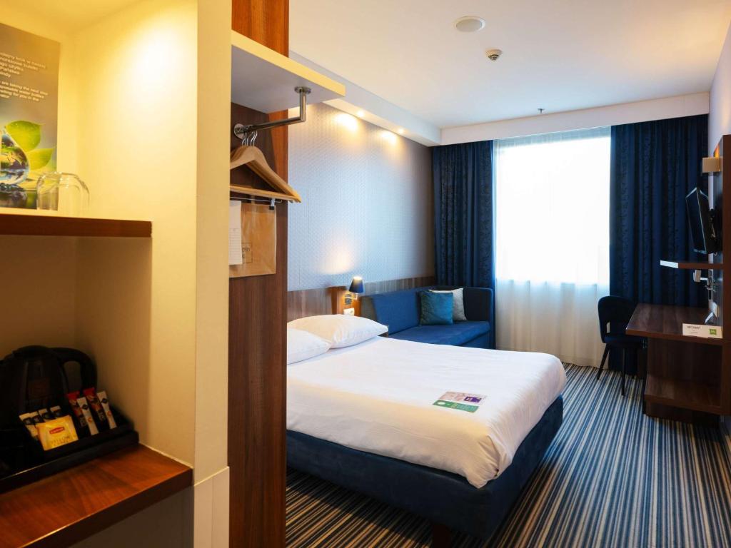 Postel nebo postele na pokoji v ubytování ibis Styles Wałbrzych