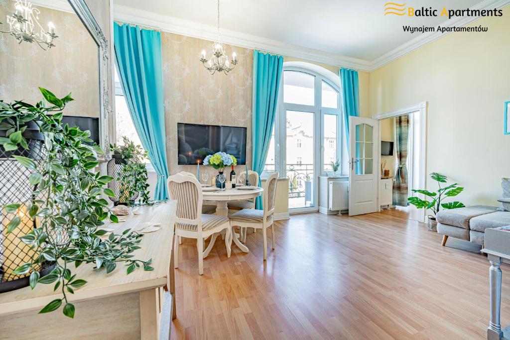 TV a/nebo společenská místnost v ubytování Baltic Apartments - Willa Carmen