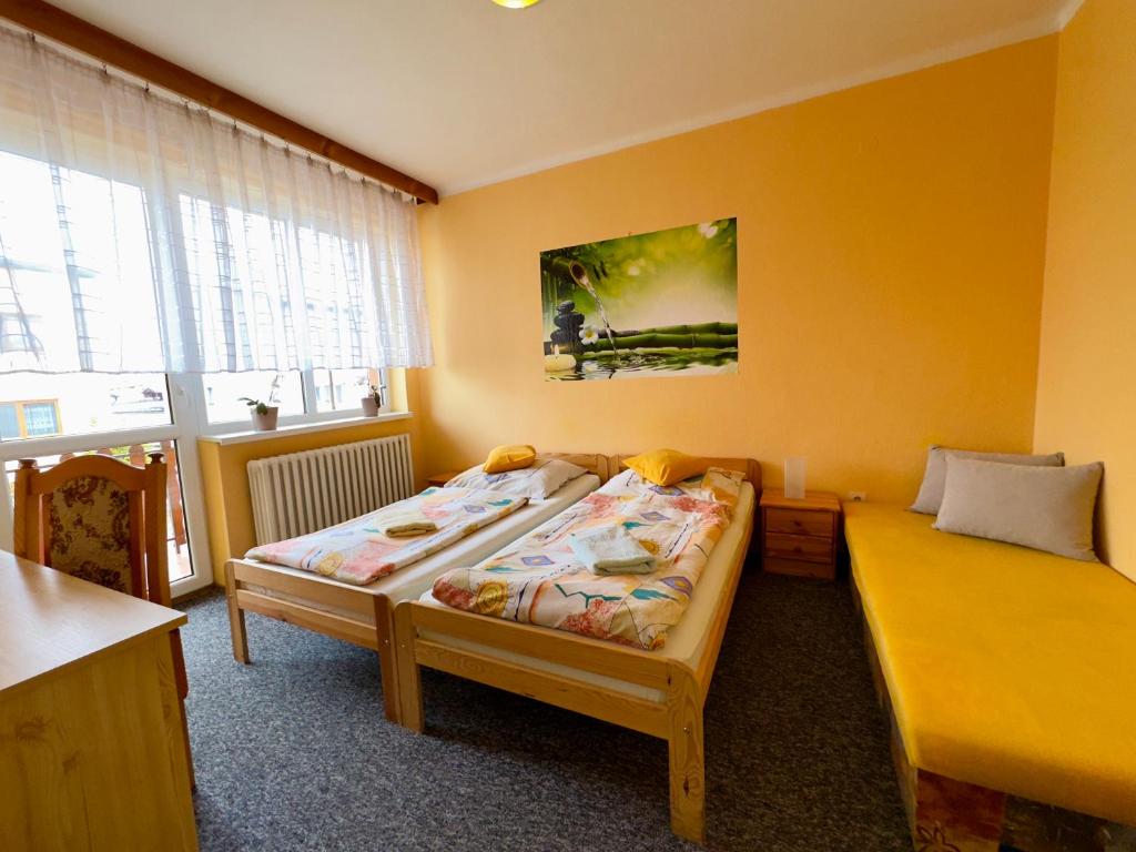 Postel nebo postele na pokoji v ubytování Privat Horec