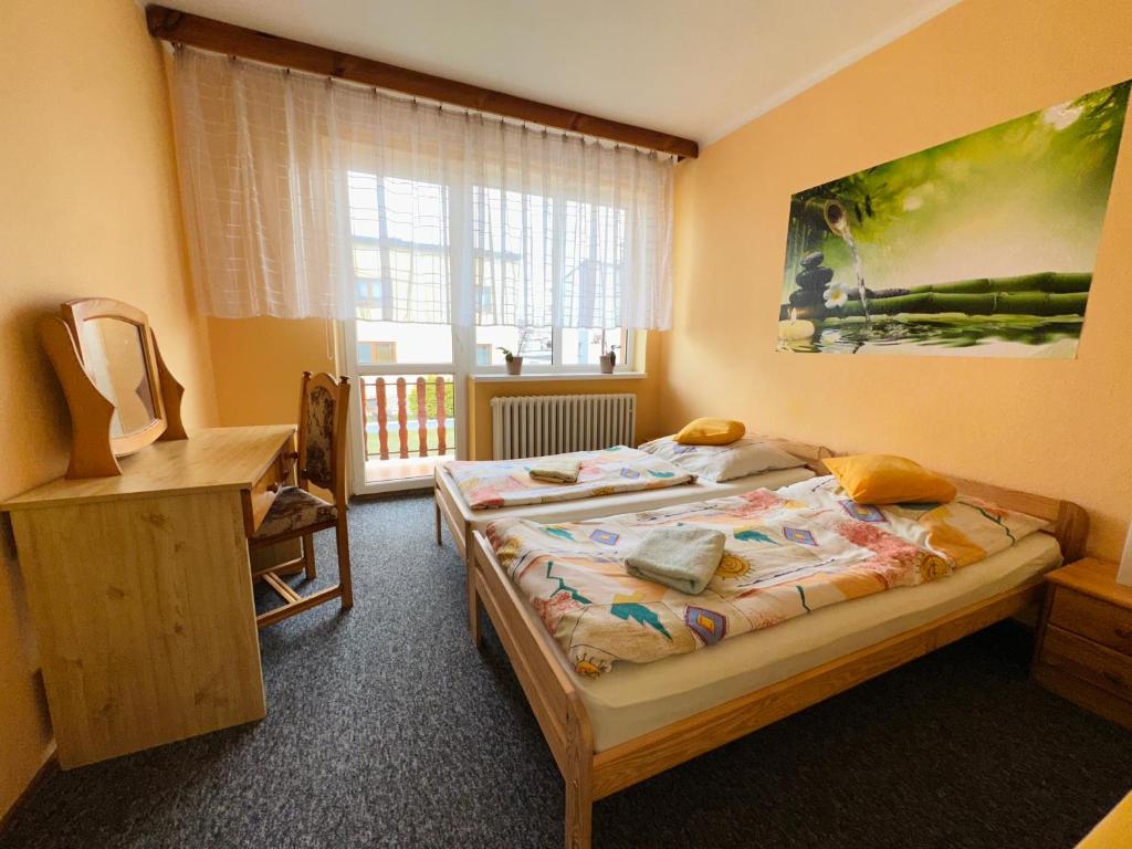 Postel nebo postele na pokoji v ubytování Privat Horec