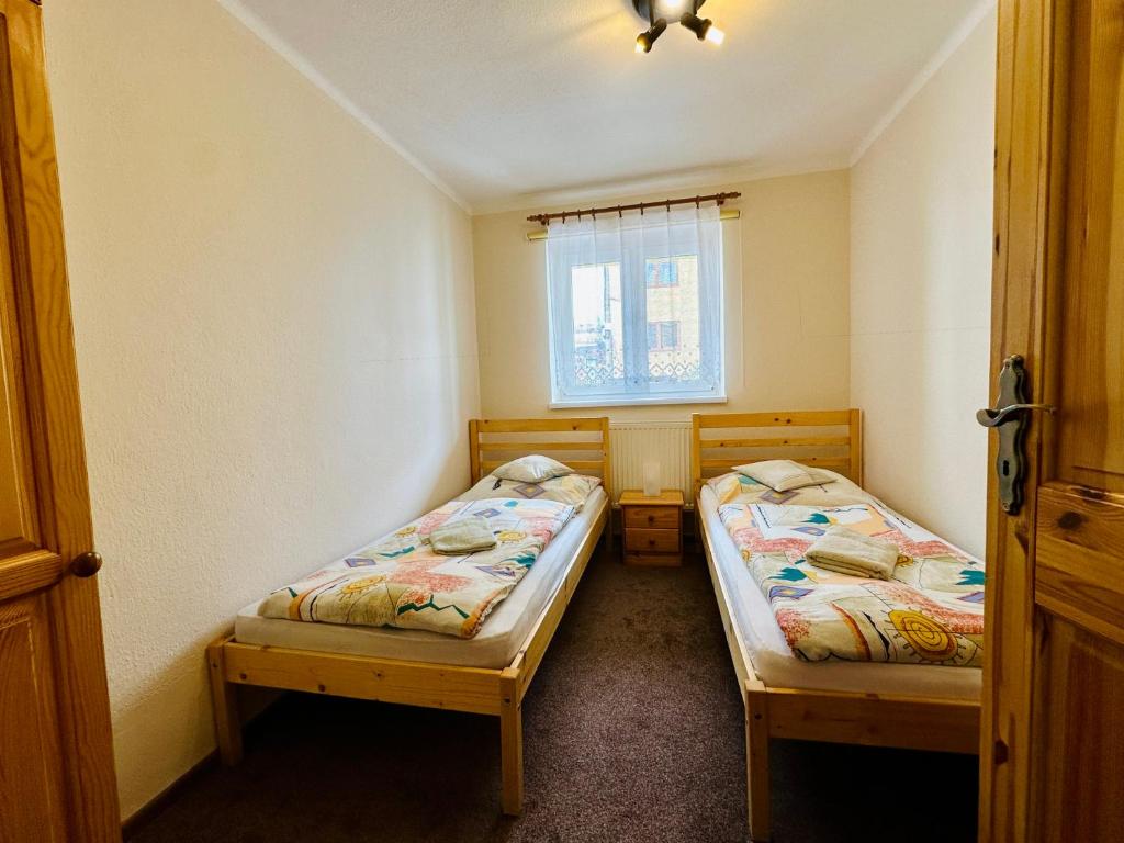 Postel nebo postele na pokoji v ubytování Privat Horec
