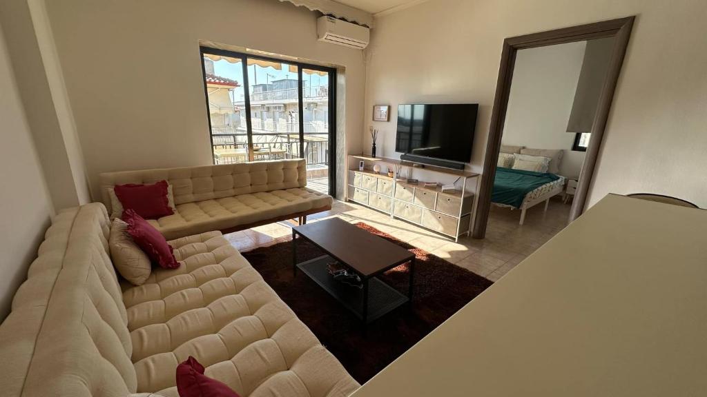 TV a/nebo společenská místnost v ubytování Gouris Appartements