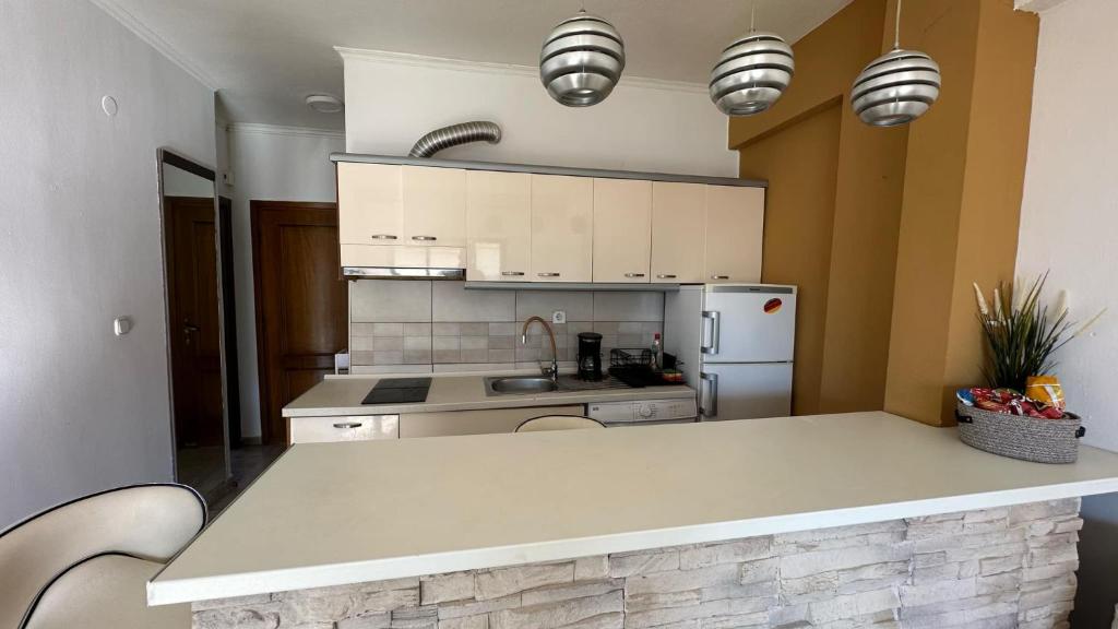 Kuchyň nebo kuchyňský kout v ubytování Gouris Appartements