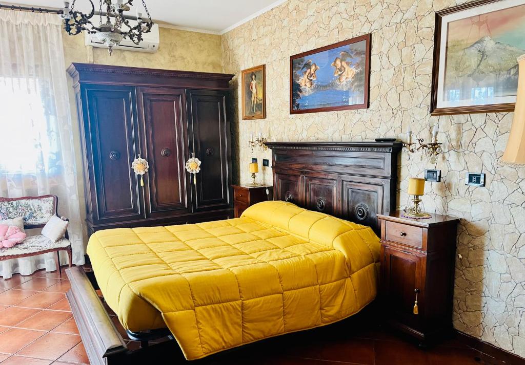 Postel nebo postele na pokoji v ubytování La Mammola Bed&Breakfast