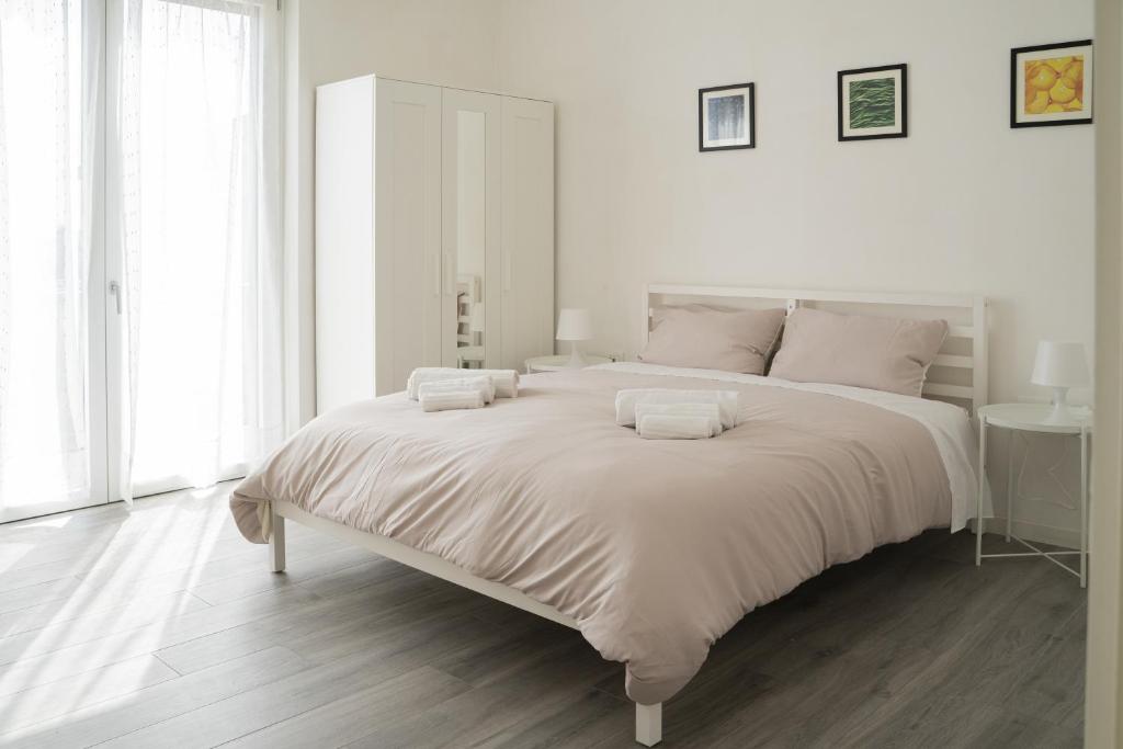 Ένα ή περισσότερα κρεβάτια σε δωμάτιο στο Marina Apartments 1