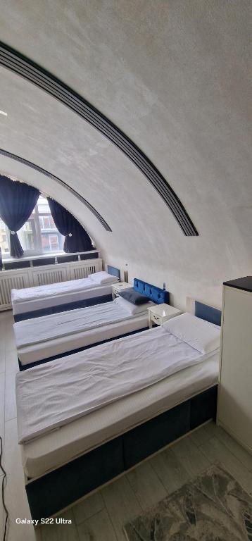 Postel nebo postele na pokoji v ubytování Hotel Jolie Apartments