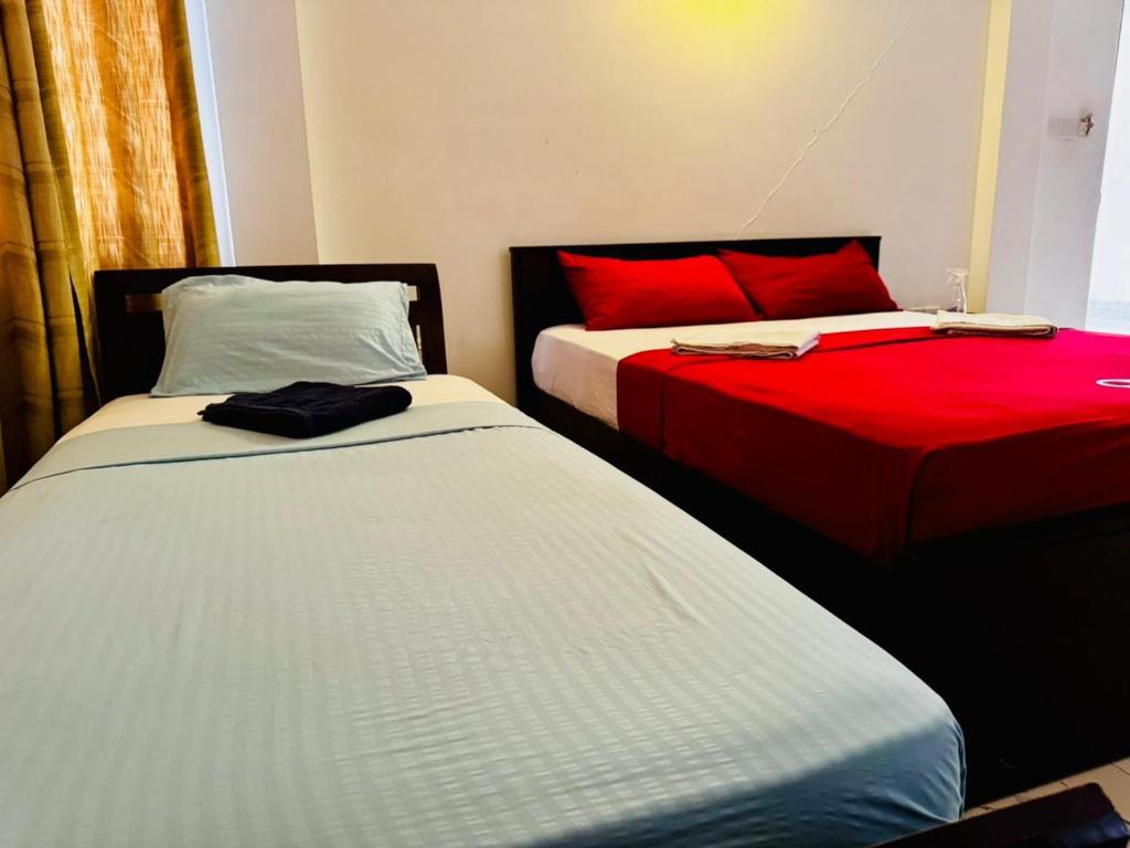 Postel nebo postele na pokoji v ubytování Mamma Raji Hotel - Freedom Paradise