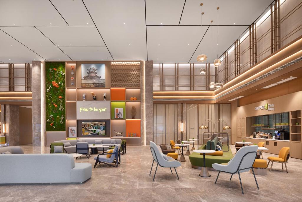 Posezení v ubytování Home2 Suite by Hilton Fuyang Taihe