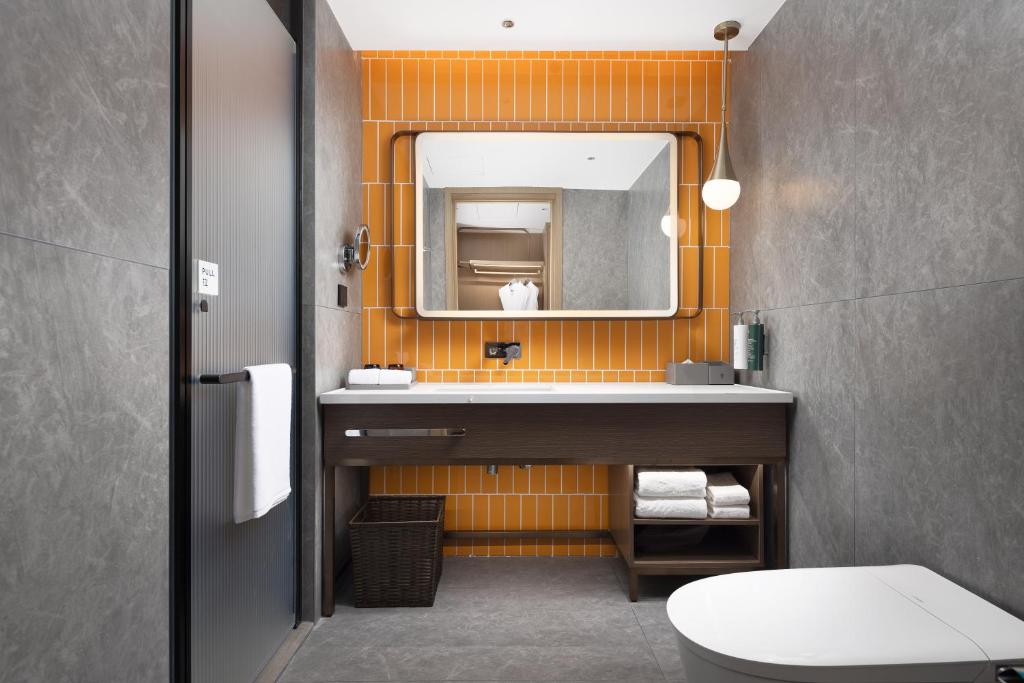 Koupelna v ubytování Home2 Suite by Hilton Fuyang Taihe