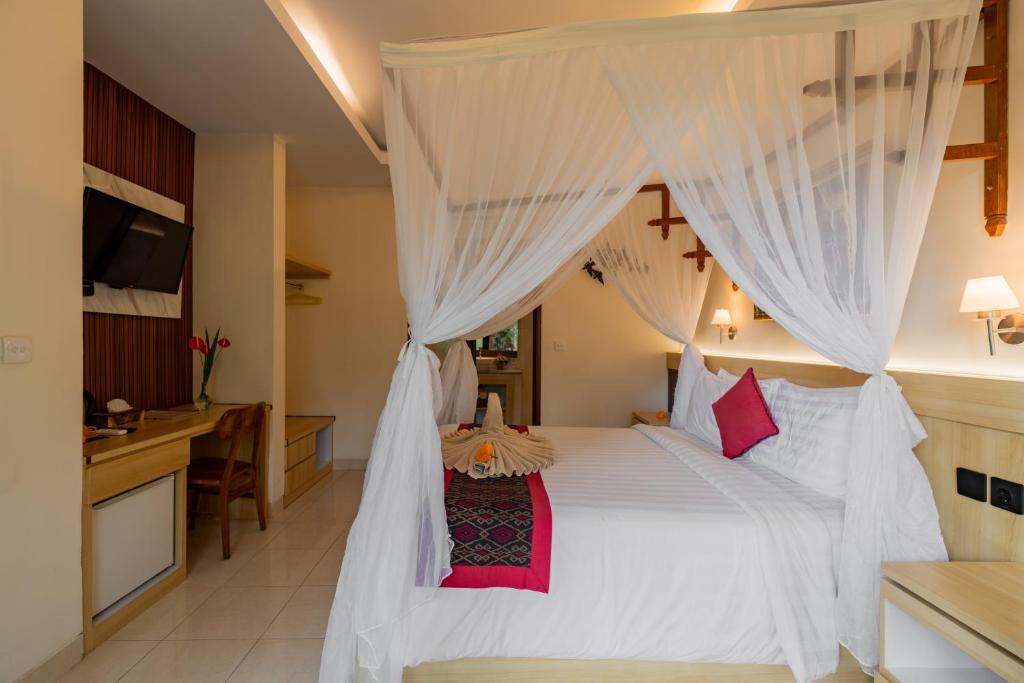 Letto o letti in una camera di Desak Putu Putra Hidden