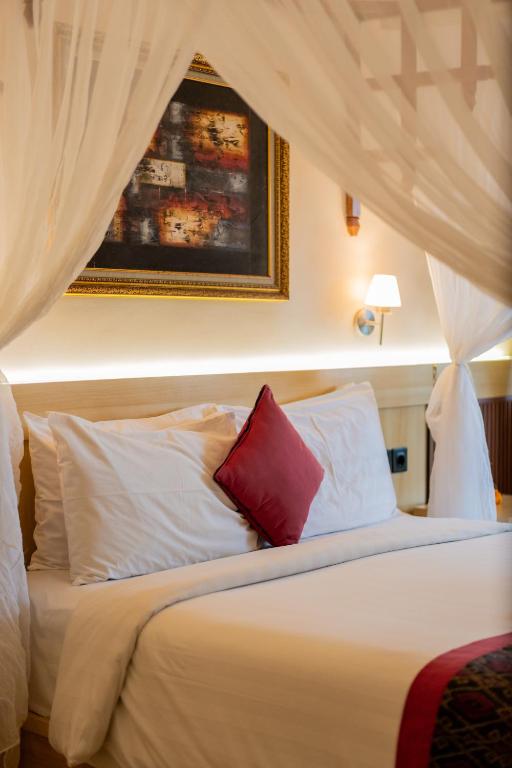 Letto o letti in una camera di Desak Putu Putra Hidden