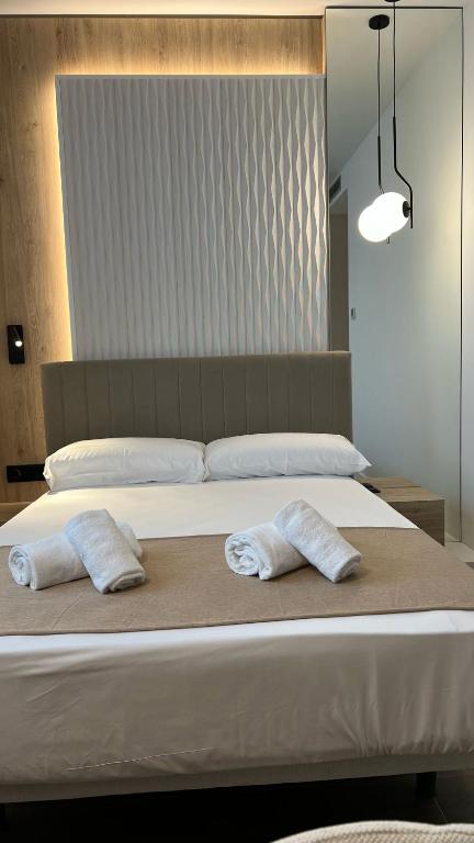 Postel nebo postele na pokoji v ubytování Hotel MLC San Sebastian