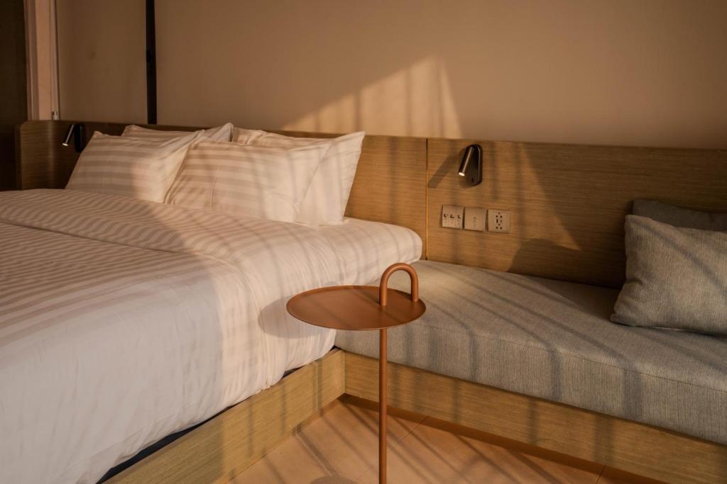 Postel nebo postele na pokoji v ubytování Inn a day