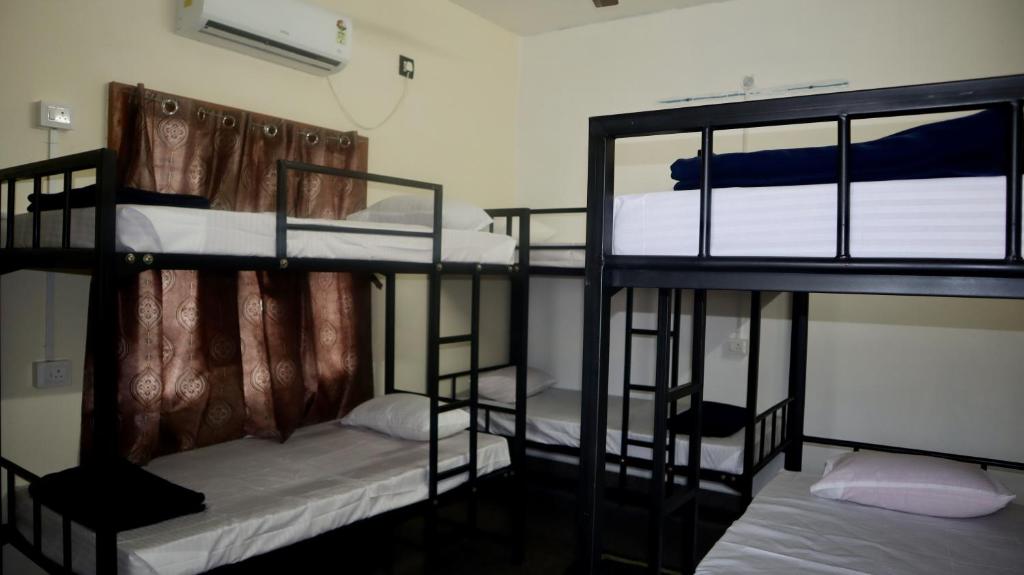 Voodi või voodid majutusasutuse Ulala Hostels - Feels like HOME toas