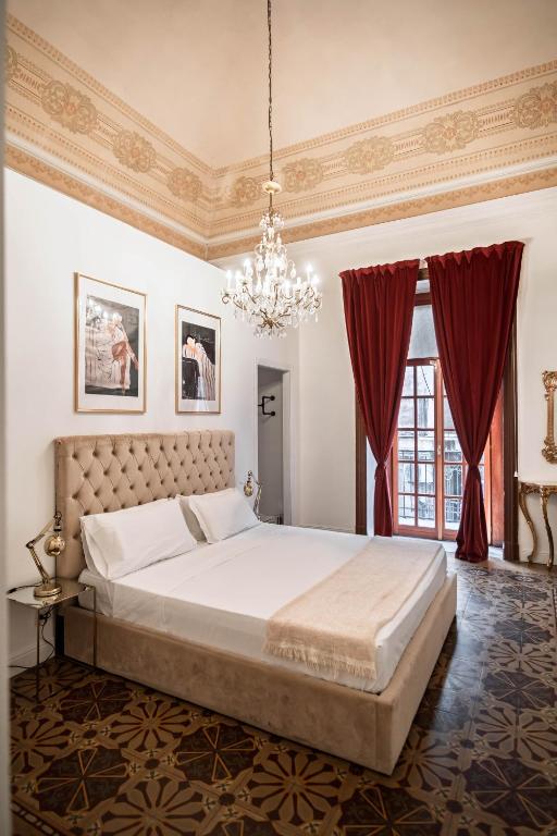 Posteľ alebo postele v izbe v ubytovaní Beretti Home