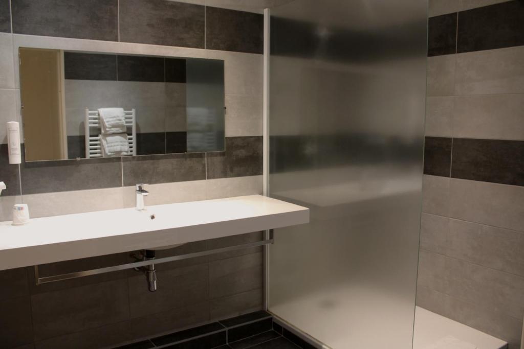 Koupelna v ubytování Hotel Poretta