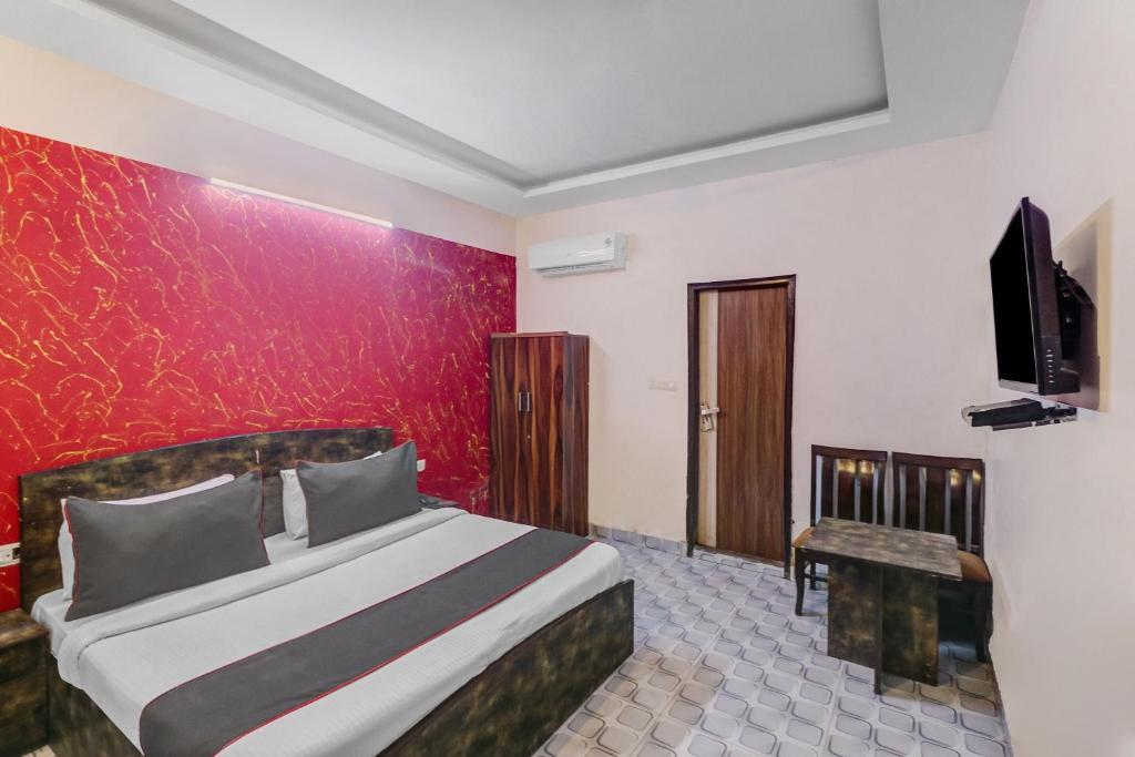 Postel nebo postele na pokoji v ubytování Hotel O One Plus One Residency