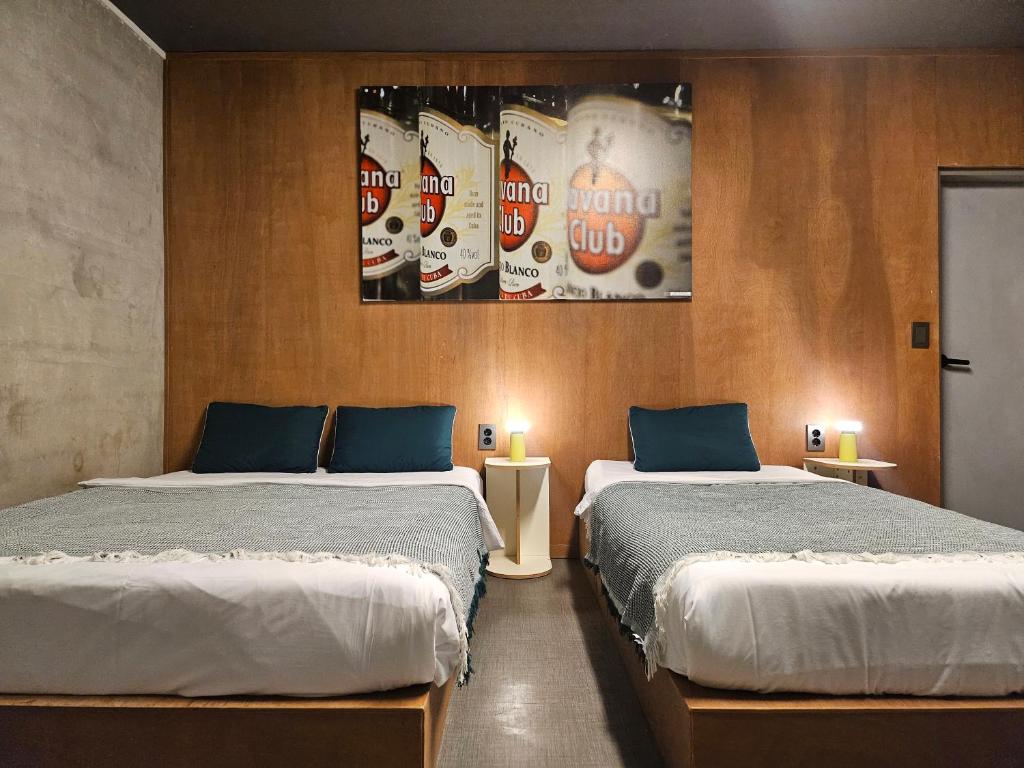 Postel nebo postele na pokoji v ubytování Mido Hostel