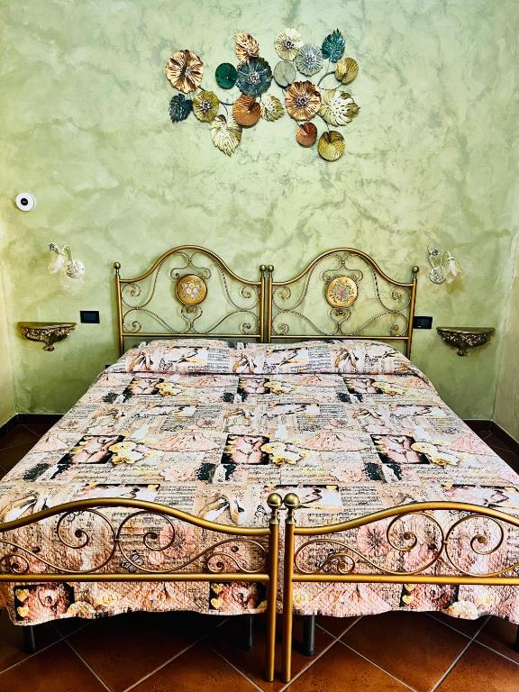 Postel nebo postele na pokoji v ubytování La Mammola Bed&Breakfast