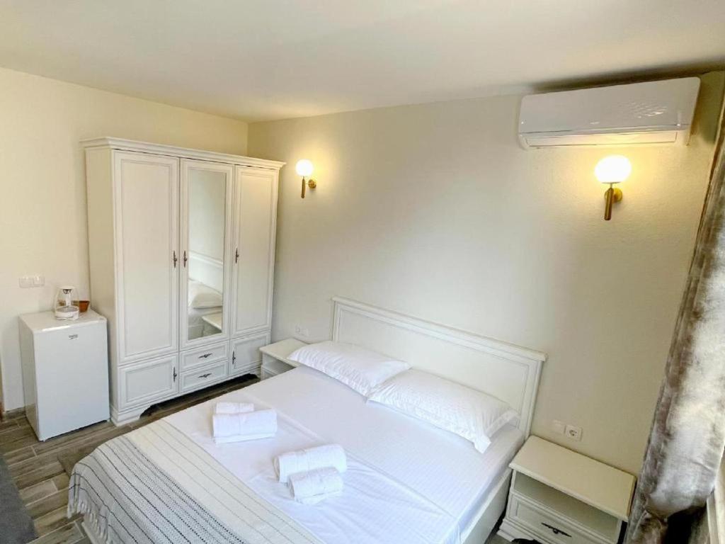 Postel nebo postele na pokoji v ubytování Guest House Bonaca