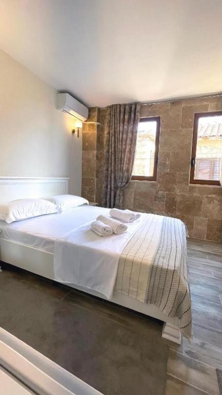 Postel nebo postele na pokoji v ubytování Guest House Bonaca