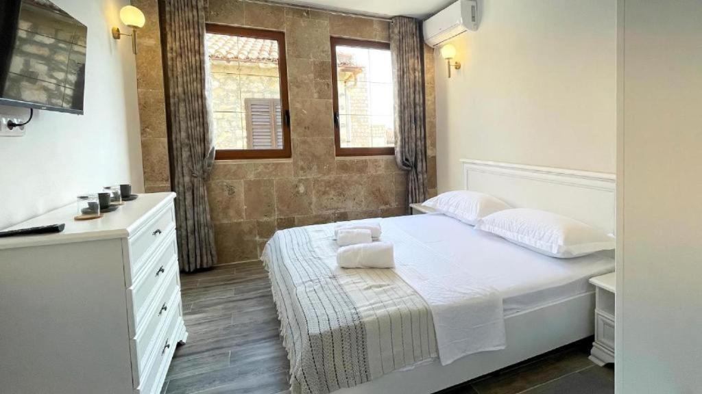 Postel nebo postele na pokoji v ubytování Guest House Bonaca