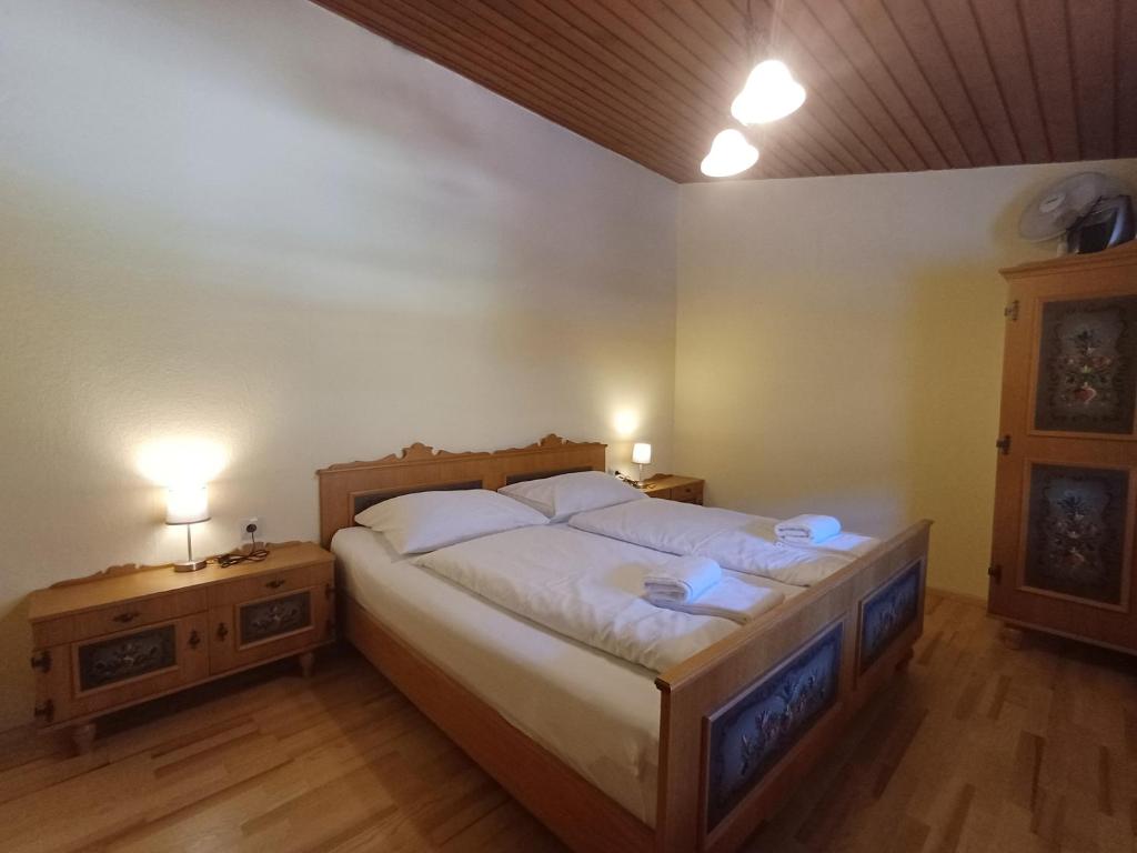 Postel nebo postele na pokoji v ubytování Apartment Schmid - Steinbock Lodges