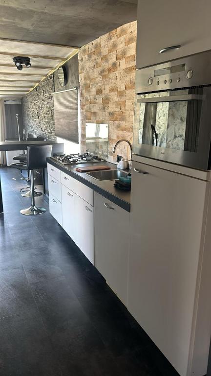 Kuchyň nebo kuchyňský kout v ubytování Chalet 151 Kniphorst Anloo