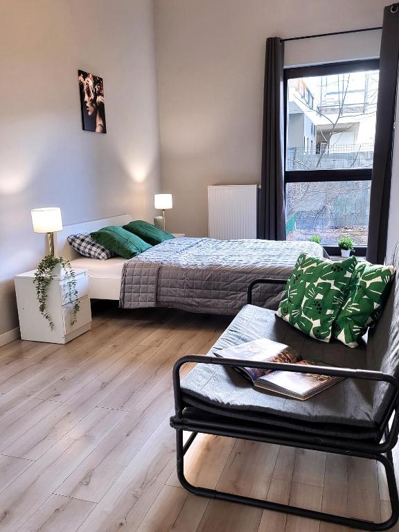 Postel nebo postele na pokoji v ubytování Chill Apartments City Link