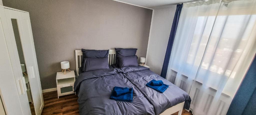 Ένα ή περισσότερα κρεβάτια σε δωμάτιο στο Apartment Hannover - Langenhagen center 2